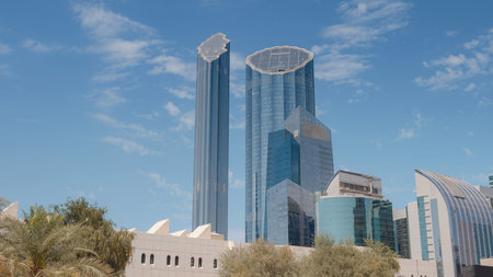 Beautiful view of the skyscrapers of Abu Dhabi over blue sky. sunny summer day