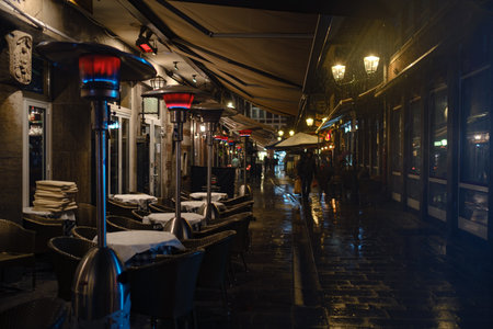 Dusseldorf. GERMANY. 13 DECEMBER 2022. The Christmas in Germany. Christmas market spirit. Celebrating Xmas holidays. Lights, carousel, small houses at market in city center with amazing food selectionのeditorial素材