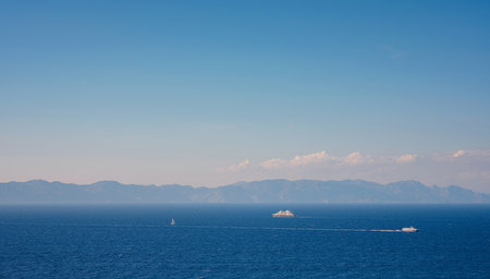 Travel to Greece, Mediterranean islands Rhodes. cruise ship in the blue waters of the Aegean Sea view under Aegean beach, view aboveの写真素材