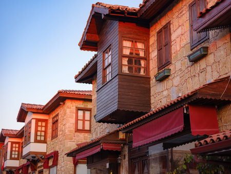 travel to ancient city of Side, Antalya coast of Turkey in tourist low season. traditional Turkish houses on narrow streets of Side. evening time without peopleの写真素材