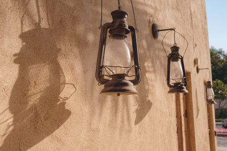 Old historic district in Dubai. Oriental Arabic old glass pendant lamps in Colorful Arabic shop souvenir.の写真素材