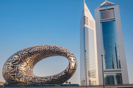 Dubai, UAE - January 16, 2024: Dubai museum of the Future from sheikh zayed road. Modern futuristic Museum built according to designed by architect Shaun Killa. Cityscape skyline.のeditorial素材