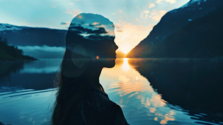 Double exposure: wide shot silhouette of a Scandinavian woman against the backdrop of the Norwegian fjords. photorealistic, sunset light.の素材