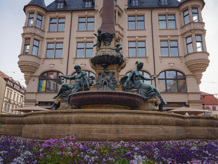 Erfurt, Germany - May 21, 2023: Angerbrunnen, a street fountain on Anger street representing industry and horticulture, main fields of Erfurt productionのeditorial素材