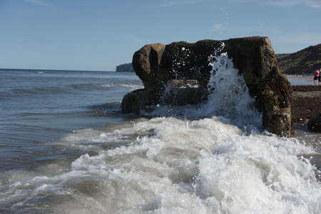 Summers day by the sea in Northern Britain.  Sea spray and wavesの写真素材
