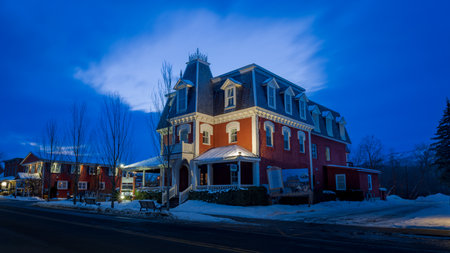 the main street of the city of Bromont with the Ski Mountain in the background. Eastern Townships, Quebec, Canada.のeditorial素材