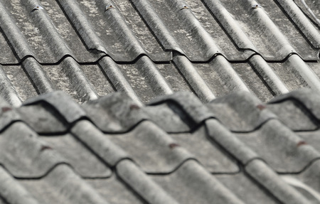 SELECTIVE FOCUS TO ZINC METAL ROOF TEXTURE BACKGROUND IN NATURE DAY LIGHTの写真素材