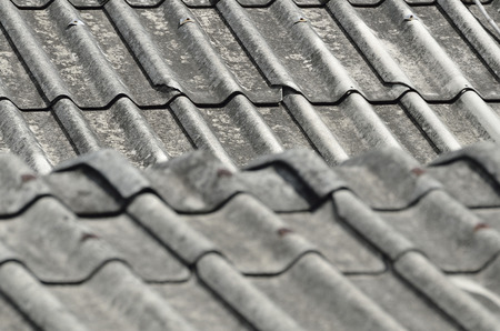 SELECTIVE FOCUS TO ZINC METAL ROOF TEXTURE BACKGROUND IN NATURE DAY LIGHTの写真素材