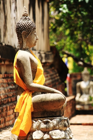 Stone statue of a Buddha in Thailand の写真素材