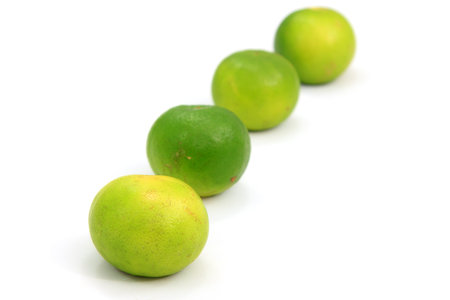 Rows of lemon on a white background