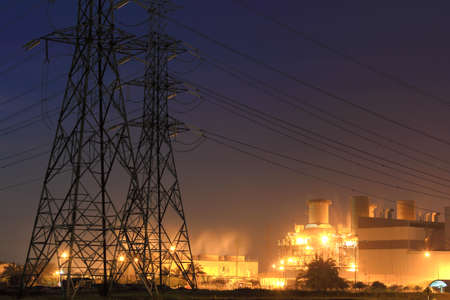 High voltage power pylons in sunset scene twilightの写真素材