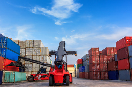 Forklift handling containers box at work のeditorial素材