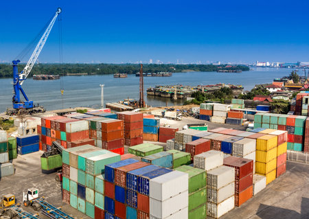 Industrial Container Cargo in harbor beside river