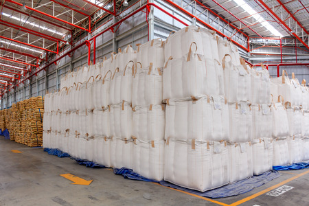 Warehouse with stacked big sacks of meal のeditorial素材