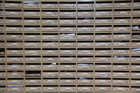 Mailboxes in the condo. wooden mailbox pattern with lockable center in condo.