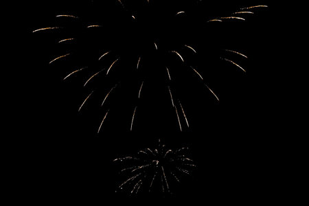 Colorful fireworks on black sky background for celebrating happy new year and merry christmasの写真素材