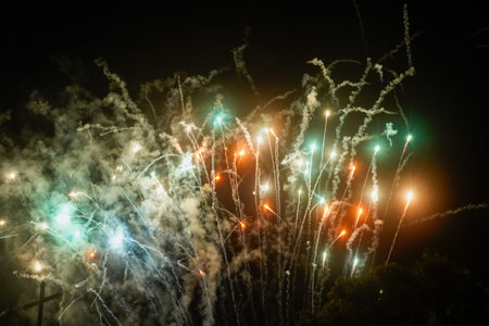 Beautiful colorful fireworks display for celebrating happy new year and merry christmas
