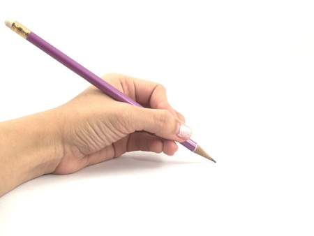 left hand with pencilの写真素材