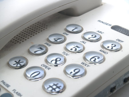 Old telephone with Dustの写真素材