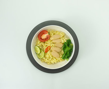 Indonesian Mie Goreng or Fried Noodle with egg traditional Indonesian or Chinese food with mustard...