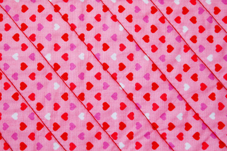 Pink fabric have pattern hearts