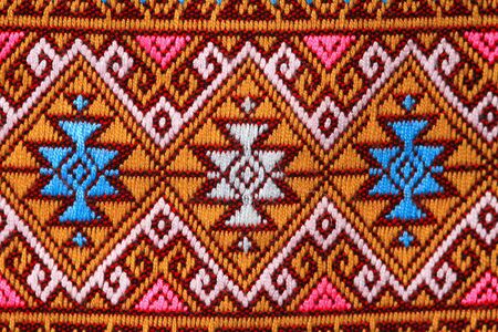 Thai silk fabric pattern backgroundの写真素材