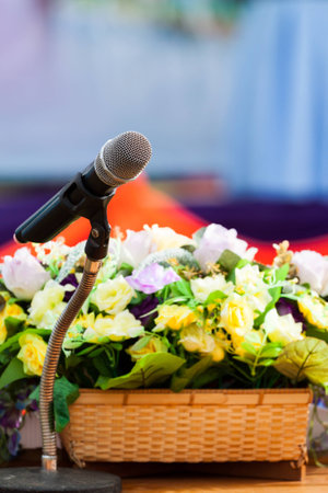 Professional microphone against peopleの写真素材