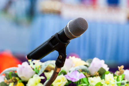 Professional microphone against peopleの写真素材