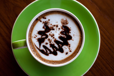 top view art hot coffee in green cup