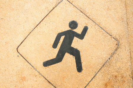 Sign runing on roadの写真素材