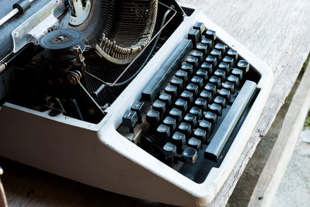 Vintage Typewriter on  wooden tableの写真素材