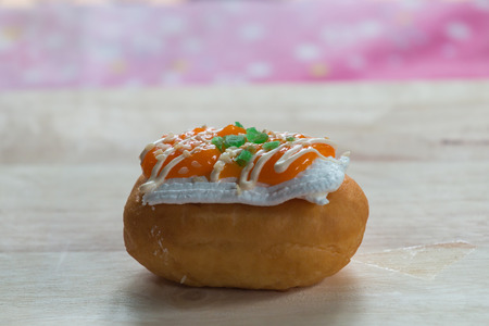 Sweet and vibrant bread on woodenの写真素材