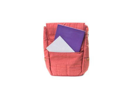 Red school backpack isolated on white backgroundの写真素材