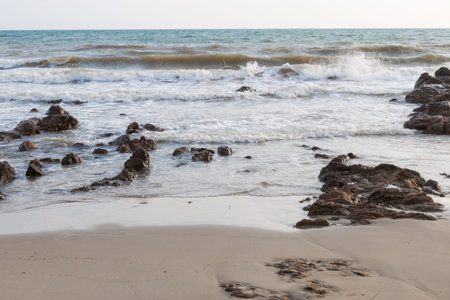 Stormy seas and crashing waves on rock