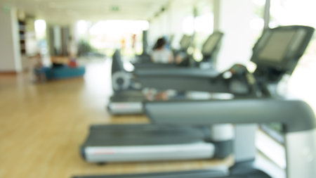 Blur abstract background modern fitness center lifestyle with health exercise equipment