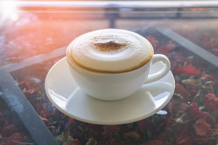 cup of coffee on table in cafeの写真素材