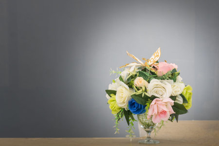 Bouquet flower in the vase on table