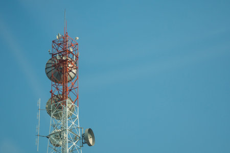Telecommunication tower and blue sky