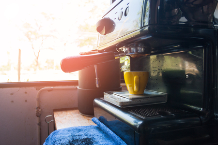 Coffee machine making espresso in a cafe with vintage styleの写真素材