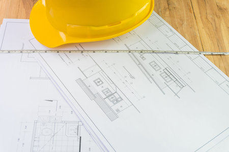 Architectural plans and tools for remodeling a homeの写真素材