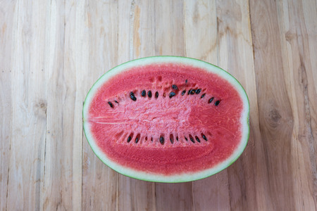 Fresh sliced watermelon on wooden backgroundの写真素材