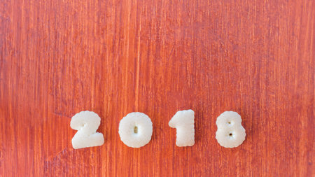 Merry Christmas and Happy new year cookies on wooden background Top view