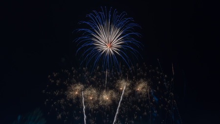 Brightly colorful fireworks in the night sky. New Year celebration fireworksの写真素材
