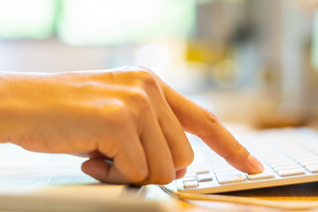 close up hand Woman working at home office