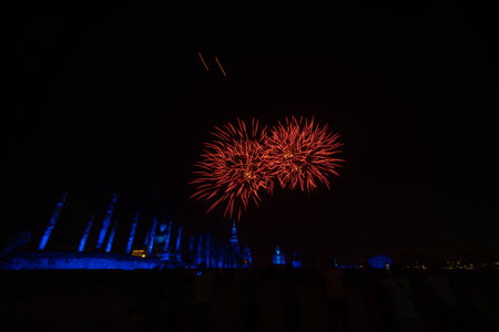 Fireworks at Sukhothai Province in the north of Thailand during the Loy Krathong Light and Candle Burning Festival and New Yearの写真素材