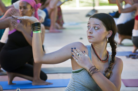 March 20-24, 2013 in Ubud, Bali, Indonesia, Photo of the large group of people from around the world attend classes of international yoga festival.のeditorial素材