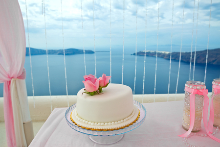 Pink decorations for wedding ceremony on the beachの写真素材