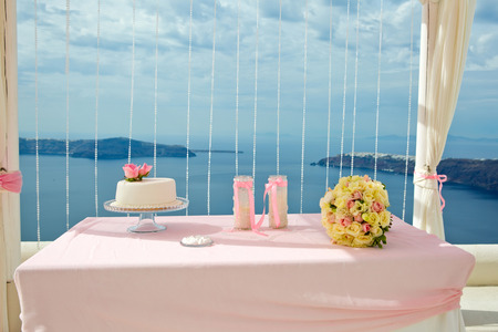 Pink decorations for wedding ceremony on the beachの写真素材