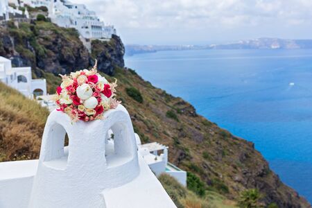 Wedding bouquet on a background of the sea, Greece, Santoriniの写真素材