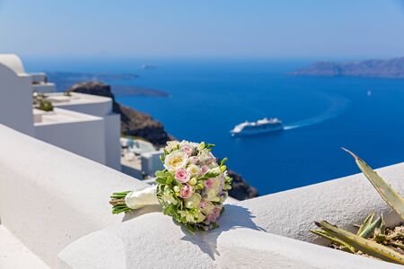 Wedding bouquet on a background of the sea Santoriniの写真素材